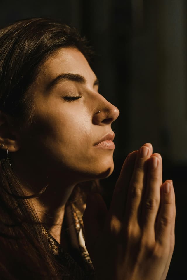 Person in prayer